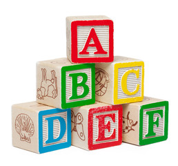 Wooden alphabet blocks isolated on white background
