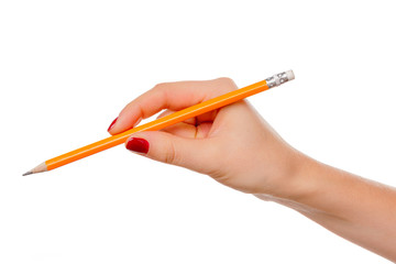 Female hand holding pencil isolated on white background