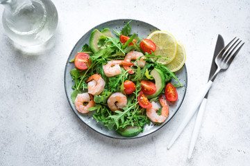 Shrimp avocado arugula salad