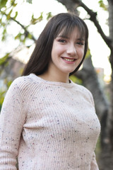 Portrait of a beautiful teenage girl. Outdoor portrait of young woman 