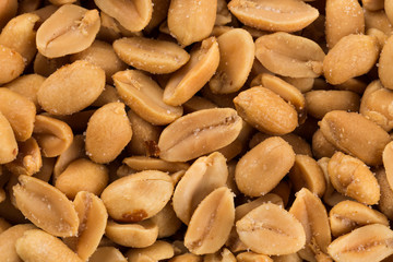 large amount of peeled salted peanuts