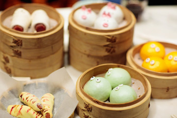Dim sum in bamboo steamer, animal theme for kids