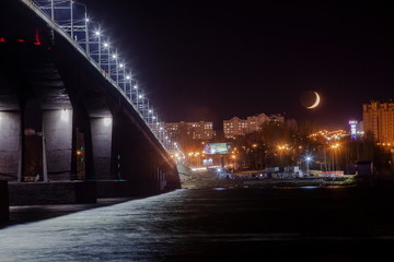 Fototapeta na wymiar night bridge and Moon