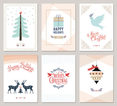 Merry Christmas and Happy Holidays cards set with New Year tree, reindeers, gift box, ornaments and typographic design. 