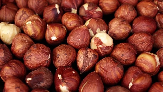 Turkish hazelnuts on rotating plate hazelnut texture