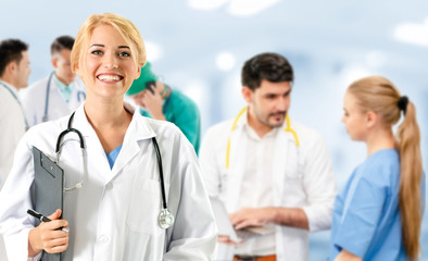 Healthcare people group. Professional doctor working in hospital office or clinic with other...