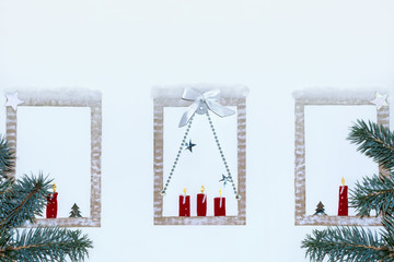 Christmas decorated windows of a cozy home. The background is white