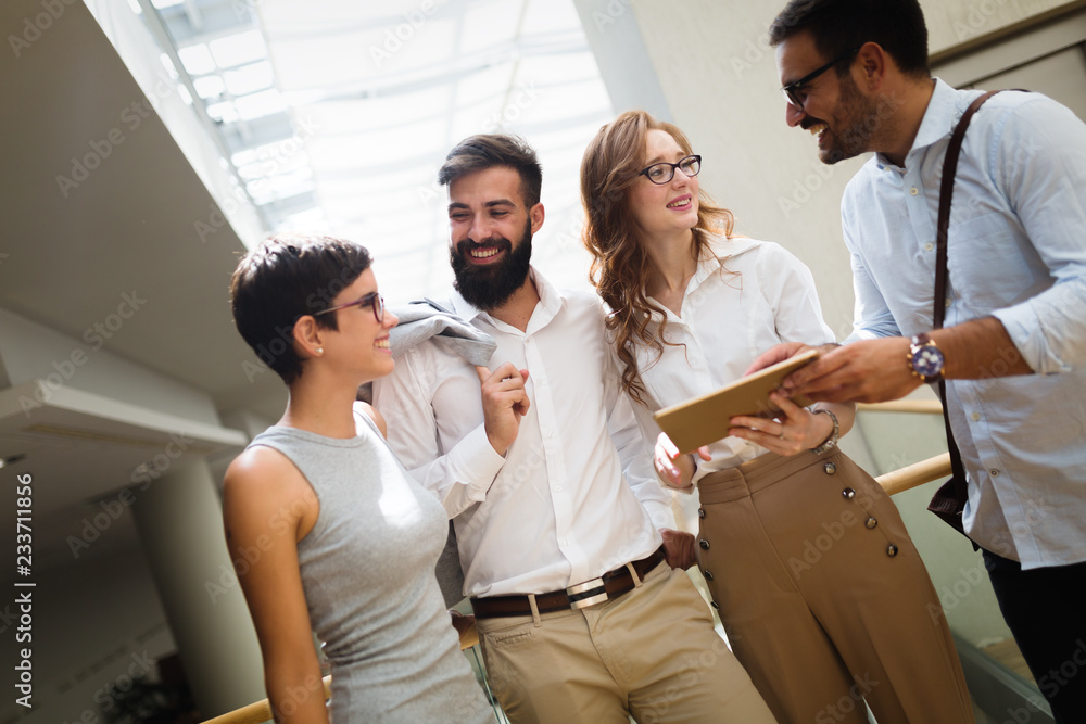 Wall mural business coworkers discussing new ideas in office