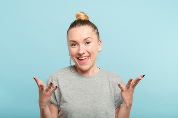 hey. smiling joyful woman gesturing with her hands. emotion expression.