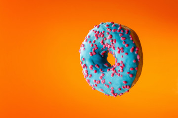 donut on orange background