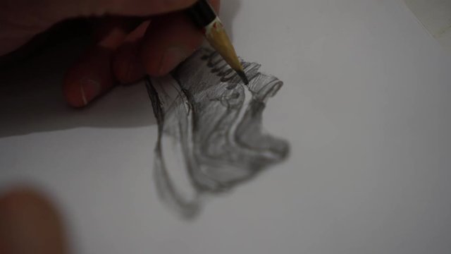 Sketch of a sneakers. Shoes Designer Creates Sketch By Hand In Fashion Design Studio