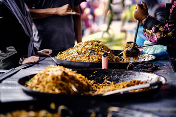 Asian, Indian and Chinese street food. Food court on local market of Langkawi island, Malaysia. Traditional asian street food.