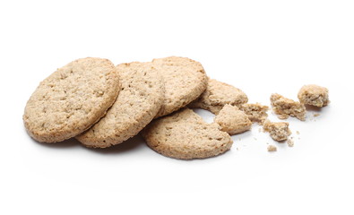 Oatmeal cookies with crumbs isolated on white background