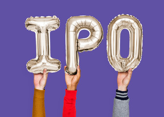 Hands holding IPO word in balloon letters