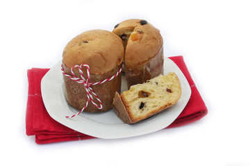 Italian Christmas cake called Panettone on white background. Traditional food to celebrate Christmas holidays
