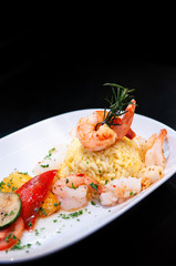 Saute shrimps, scallop, squid with pepper chilli with Mediterranian roast vegetable and saffron rice