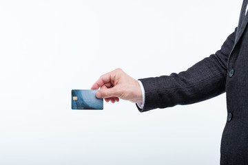 secure online payments with credit card. financial safety and bank account management. man holding plastic card.