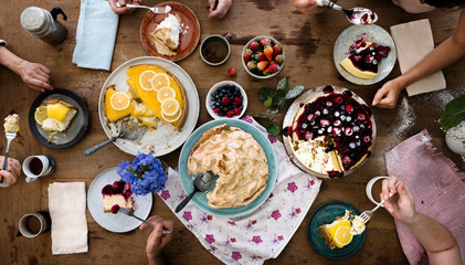 People having dessert at a dining table