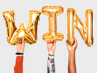 Hands showing win balloons word - obrazy, fototapety, plakaty