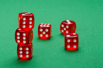 many red cubes are on the green table