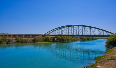 Fototapeta na wymiar Jucar Xuquer river bridge in Fortaleny