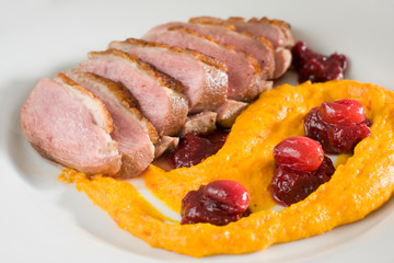 duck breasts with squash puree and cranberries