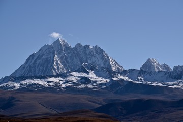 Tibetan holy mountain Mt. Yala with its summit at 5820m, taken from Tagong, Sichuan, China. 