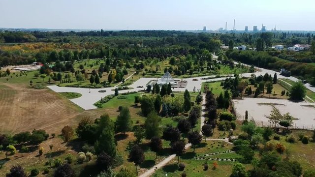 Aerial view of the Botanical Garden in Ploiesti City, Romania , showing various species of trees, shrubs and flowers and decorative water fountain
