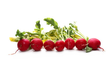 Fresh red radishes with leaves isolated on white background