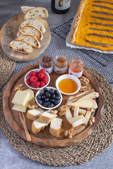 Served table - wine appetizer, cheese assortment