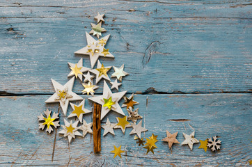 Merry Christmas: Background, decoration with stars on old blue wooden board :)