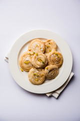 Chirote or Chiroti is a sweet dish from Karnataka and Maharashtra. Served in a plate as a dessert on Festivals or wedding. Selective focus