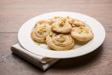 Chirote or Chiroti is a sweet dish from Karnataka and Maharashtra. Served in a plate as a dessert on Festivals or wedding. Selective focus