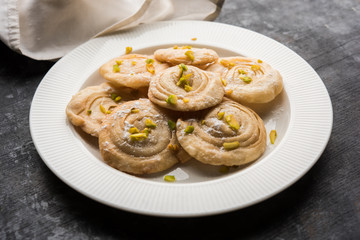 Chirote or Chiroti is a sweet dish from Karnataka and Maharashtra. Served in a plate as a dessert on Festivals or wedding. Selective focus