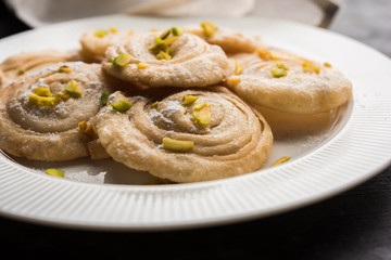 Chirote or Chiroti is a sweet dish from Karnataka and Maharashtra. Served in a plate as a dessert on Festivals or wedding. Selective focus