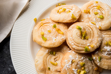 Chirote or Chiroti is a sweet dish from Karnataka and Maharashtra. Served in a plate as a dessert on Festivals or wedding. Selective focus