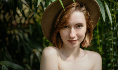 Portrait of beautiful woman with freckles.