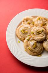 Chirote or Chiroti is a sweet dish from Karnataka and Maharashtra. Served in a plate as a dessert on Festivals or wedding. Selective focus