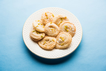 Chirote or Chiroti is a sweet dish from Karnataka and Maharashtra. Served in a plate as a dessert on Festivals or wedding. Selective focus