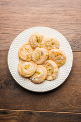 Chirote or Chiroti is a sweet dish from Karnataka and Maharashtra. Served in a plate as a dessert on Festivals or wedding. Selective focus