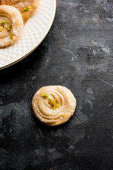 Chirote or Chiroti is a sweet dish from Karnataka and Maharashtra. Served in a plate as a dessert on Festivals or wedding. Selective focus