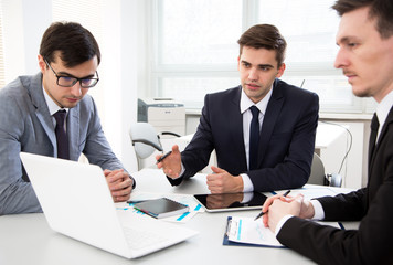 Businessmen working in an office