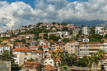 Fototapeta na wymiar The picturesque city of Herceg Novi in Montenegro on a green hill