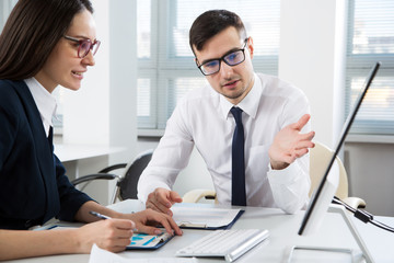 Fototapeta premium Businesspeople in a meeting at office
