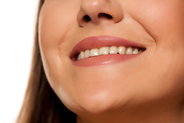 Smiling woman with natural and healthy teeth