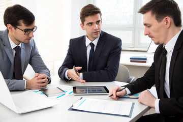 Businessmen working in an office
