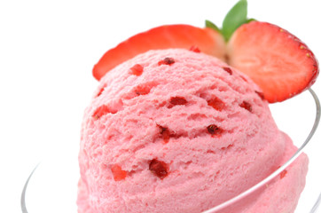 Strawberry ice cream in sundae cup or glass with fruits isolated on white background