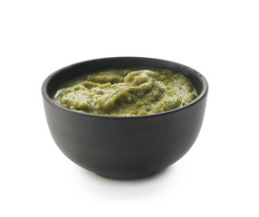 Tasty sauce in bowl on white background