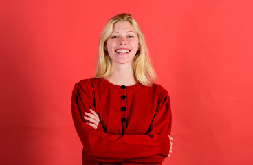Brilliant smile concept. Girl blonde happy smiling face over red background. Emotional woman happy...