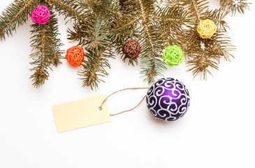 Christmas decorations concept. Everything you need to decorate christmas tree. Decorative ball toy and gift tag copy space. Get ready for christmas. Christmas decorations white background top view